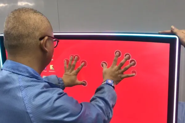 Mutual capacitance electrode grid diagram showing row and column intersections for multi-touch detection